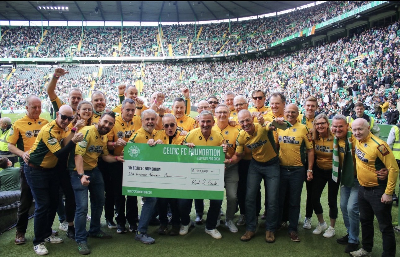 The Road To Seville team presenting a cheque to Celtic FC Foundation