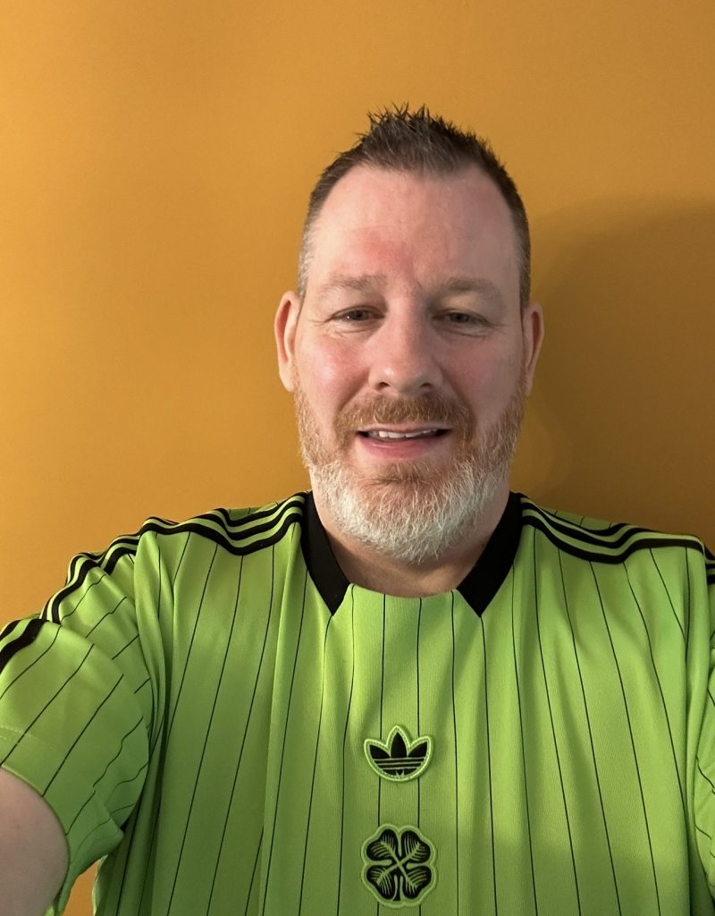 Celtic neon green and black terrace shirt from season 2025 2026 by Adidas